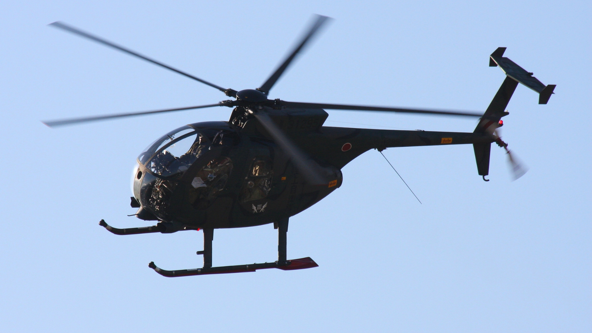 Army rescue helicopter arriving to evacuate a client during a trek