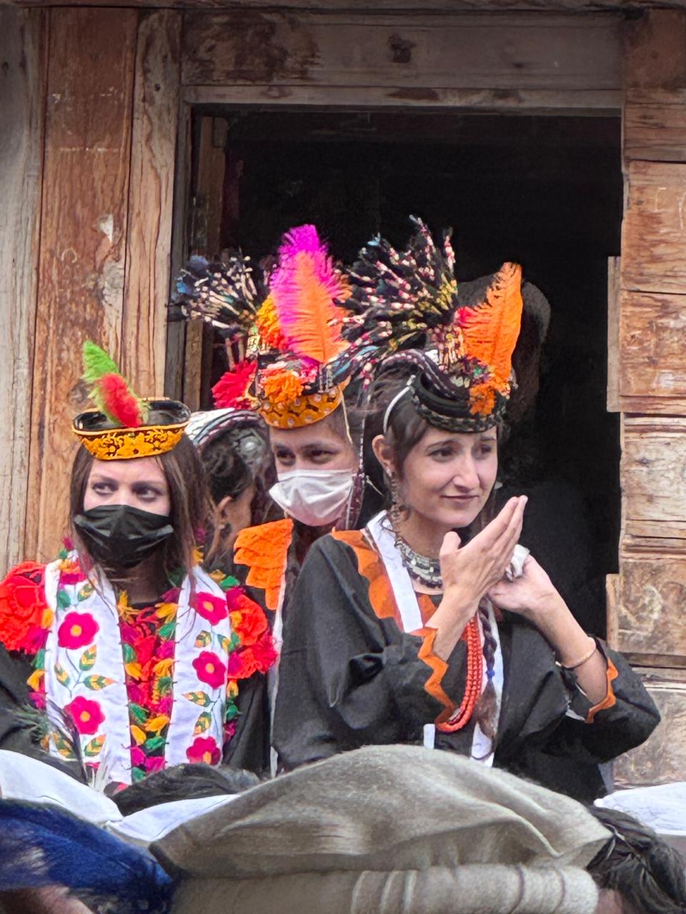 Kalasha women in traditional embroidered dresses during Chilam Joshi spring festival