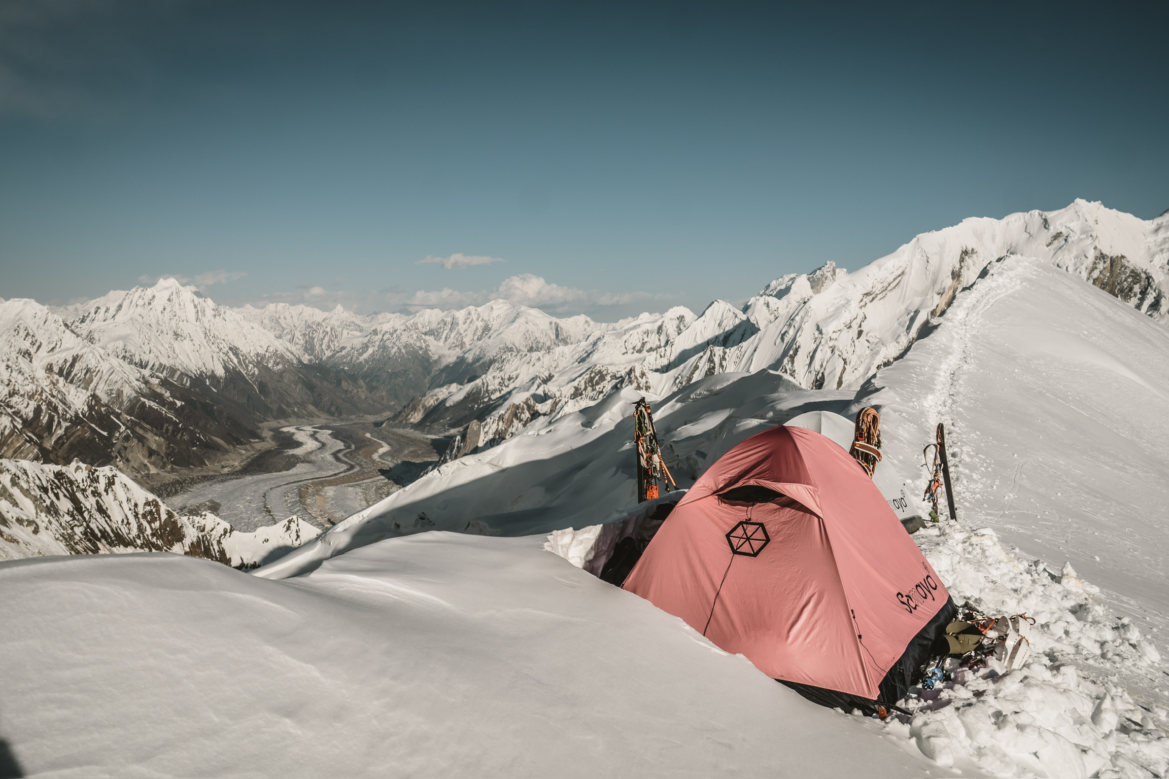 Base camp tents in a high mountain setting